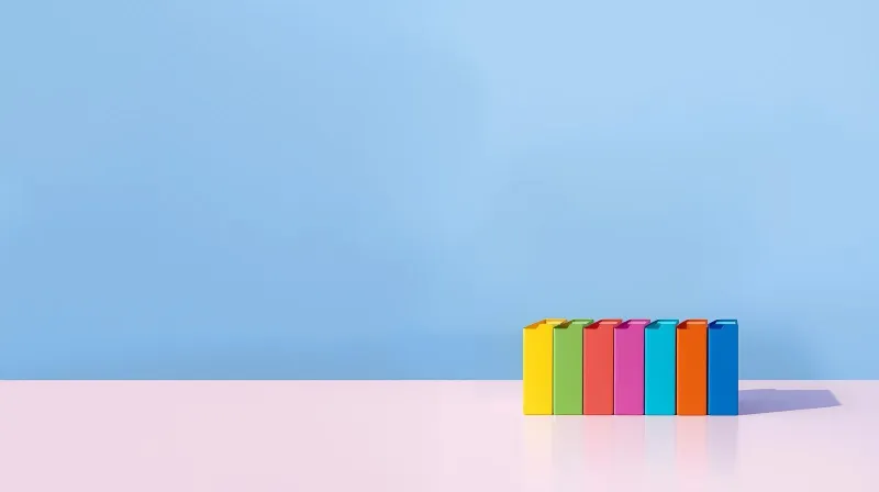 A tidy collection of neatly arranged colored folders on a clean desk representing Sensei LMS's focused feature set for WordPress course creation