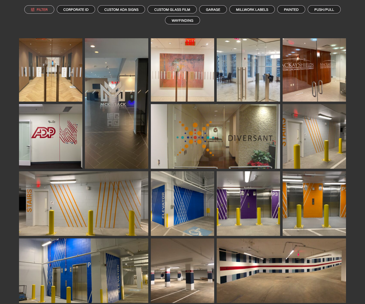 The Coyle and Company interior signage portfolio, with category filters above a grid of project photographs